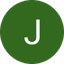 White letter J on a dark green circle icon with black background.