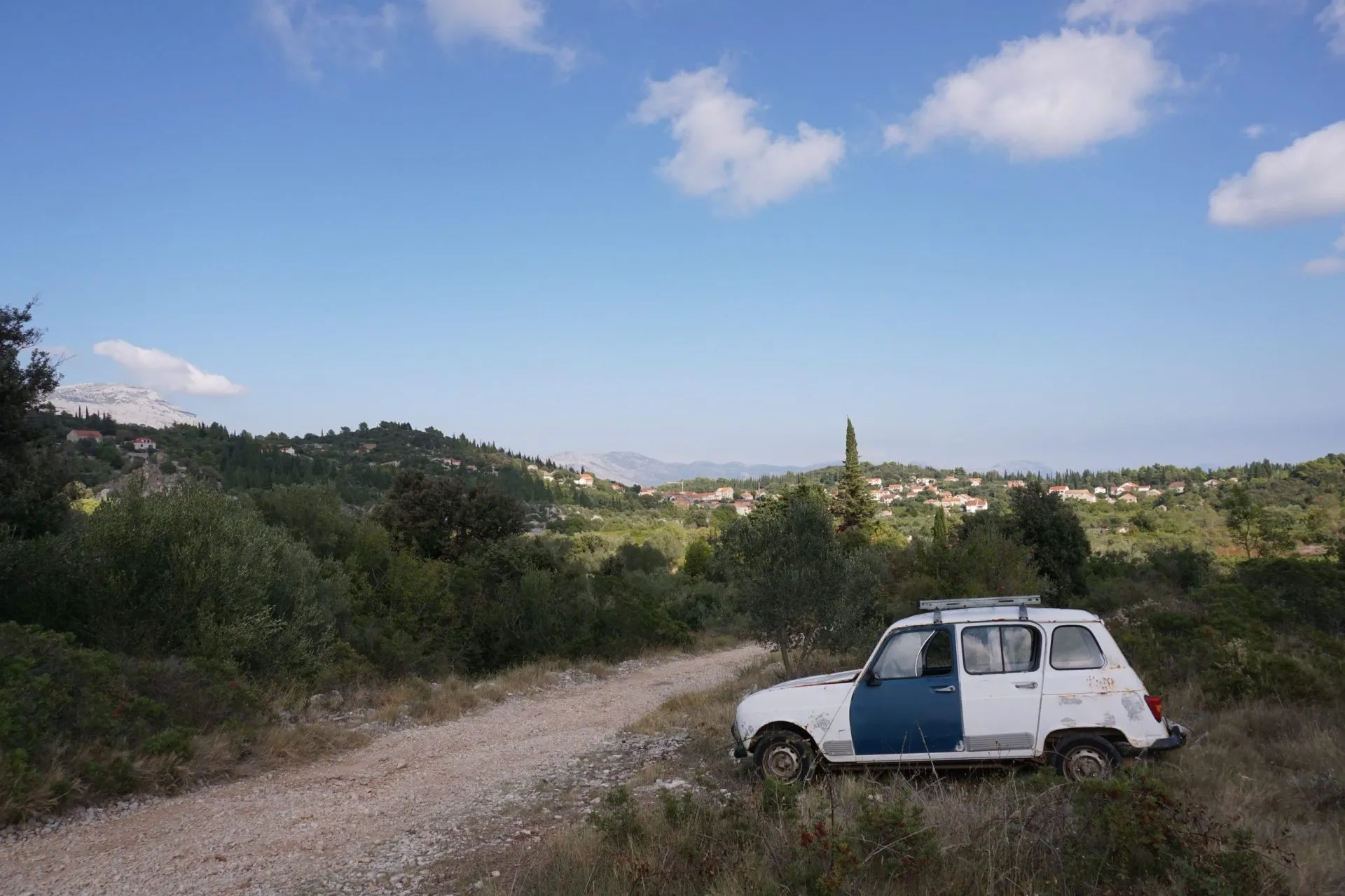 Abandoned old car in the middle of nowhere on the island of korcula