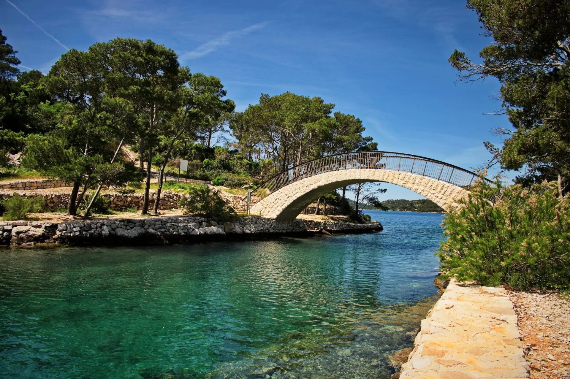 Stone bridge on island Mljet in Croatia between Large and Small lake